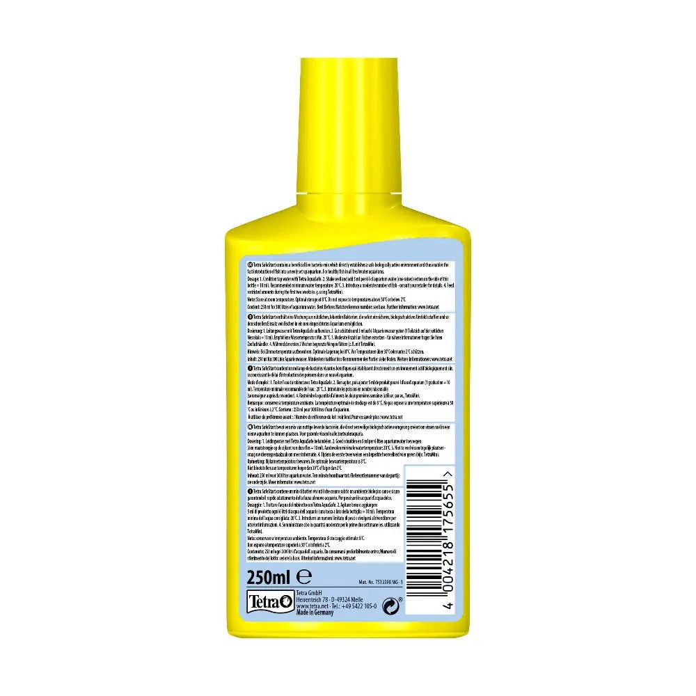 Yellow bottle of Tetra fish food with detailed ingredient and feeding instructions on the label.