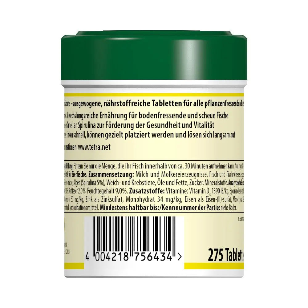 Nutrient-rich fish food tablets in a green container for healthy aquatic diets.