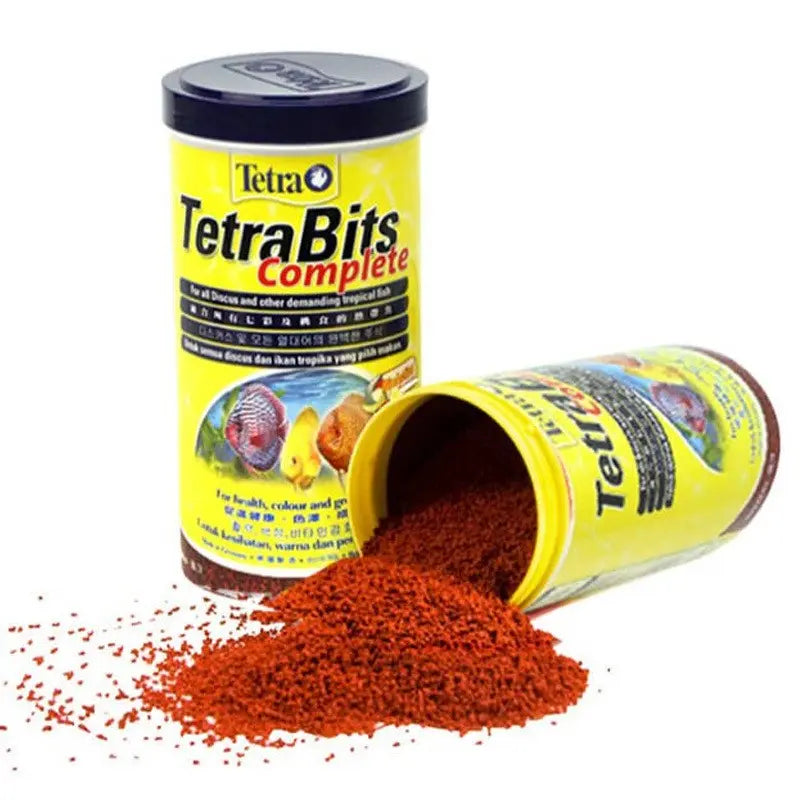 TetraBits Complete fish food in a canister, ideal for tropical fish nutrition and feeding.