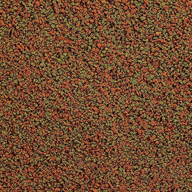 Colorful pet food kibble mix with various shapes and sizes for balanced nutrition.