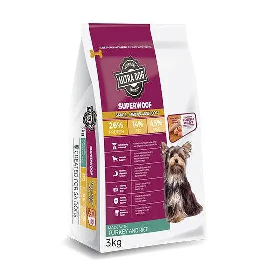 Ultra Dog Superwoof dog food bag with turkey and rice, featuring protein content and feeding guide.