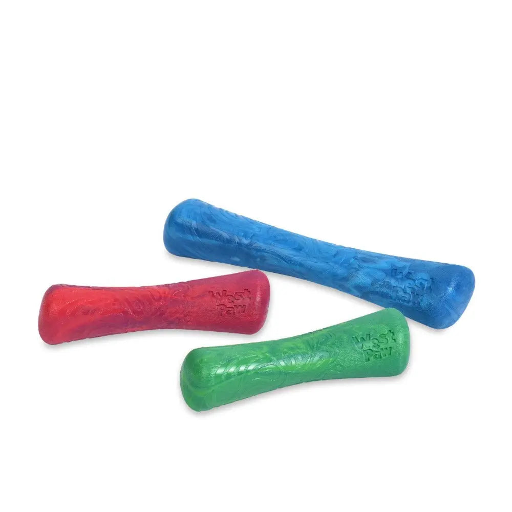 Colorful dog chew toys in red, blue, and green for interactive play and dental health.